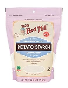 A 6 oz package of red mill potato starch, showcasing its fine texture and vibrant red packaging.