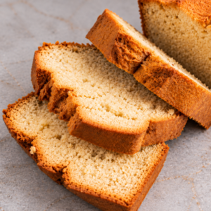 Slices of eggless cake showing a dry, crumbly texture